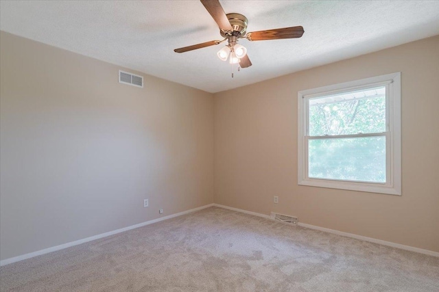 107 S Regency Dr, Bloomington, IL 61701 - unfurnished room with light colored carpet and ceiling fan