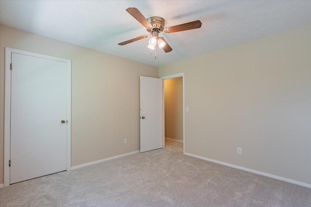107 S Regency Dr, Bloomington, IL 61701 - unfurnished bedroom featuring carpet and ceiling fan