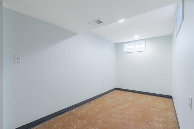 107 S Regency Dr, Bloomington, IL 61701 - below grade area featuring baseboards