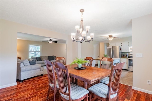 107 S Regency Dr, Bloomington, IL 61701 - dining room with ceiling fan, wood finished floors, and a chandelier
