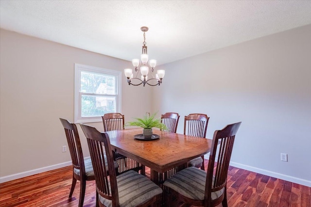 107 S Regency Dr, Bloomington, IL 61701 - dining space featuring a chandelier and dark wood-style flooring