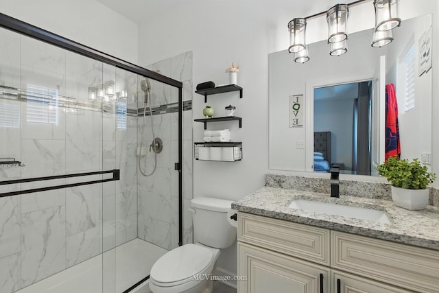 8566 S 83rd Ave, Hickory Hills, IL 60457 - bathroom featuring vanity, ensuite bathroom, and a marble finish shower