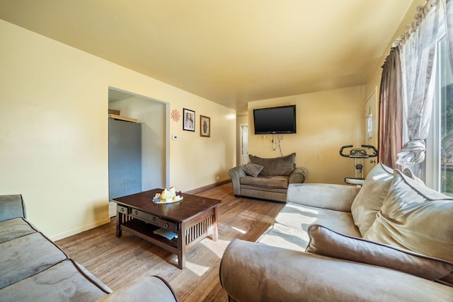 8116 Leamington St, Burbank, IL 60459 - living room with wood finished floors and baseboards