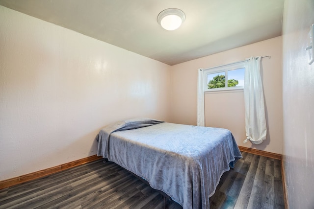 8116 Leamington St, Burbank, IL 60459 - bedroom featuring baseboards and dark wood-style flooring
