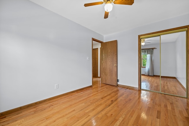 15893 Aime Ln, Wadsworth, IL 60083 - unfurnished bedroom with light wood-style flooring, a closet, and ceiling fan