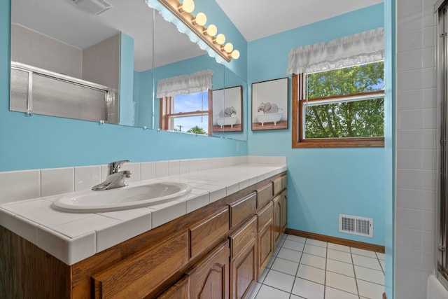 15893 Aime Ln, Wadsworth, IL 60083 - full bath featuring vanity, plenty of natural light, and tile patterned flooring