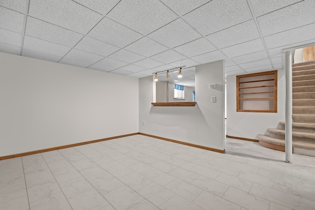15893 Aime Ln, Wadsworth, IL 60083 - below grade area featuring track lighting, stairway, and a drop ceiling