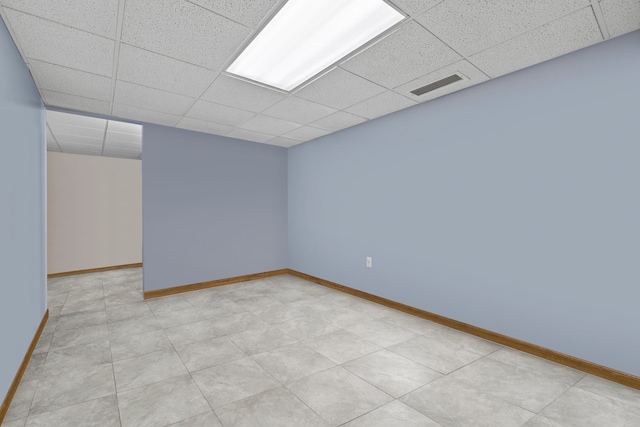 15893 Aime Ln, Wadsworth, IL 60083 - spare room featuring a paneled ceiling and baseboards