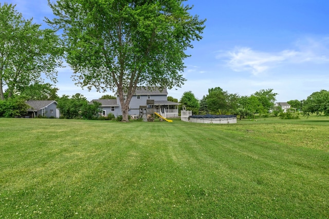 15893 Aime Ln, Wadsworth, IL 60083 - view of green lawn with a covered pool and stairs