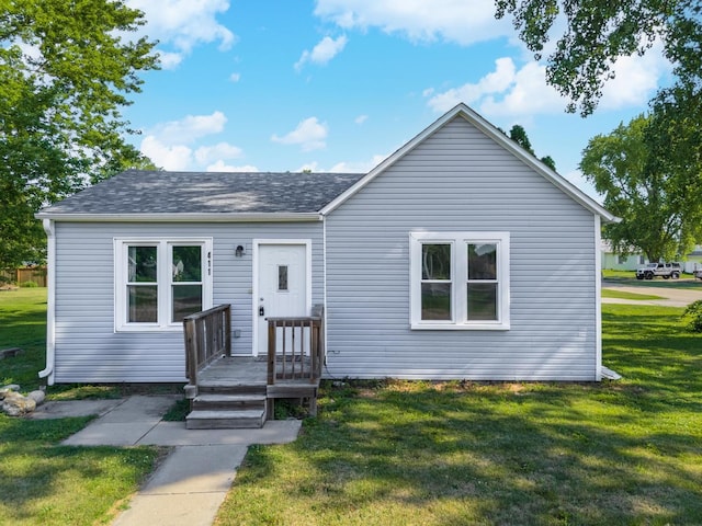 411 E Mazon St, Gardner, IL 60424 - view of front of property with a front lawn and roof with shingles