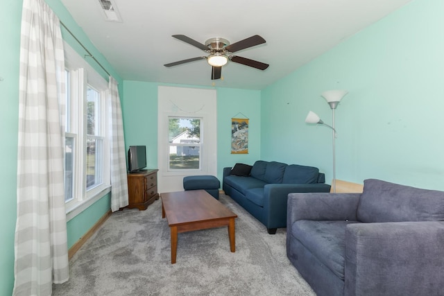 411 E Mazon St, Gardner, IL 60424 - carpeted living area with ceiling fan and baseboards