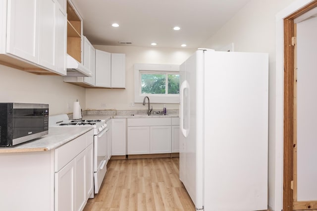 411 E Mazon St, Gardner, IL 60424 - kitchen featuring white appliances, light wood-style flooring, under cabinet range hood, recessed lighting, and open shelves