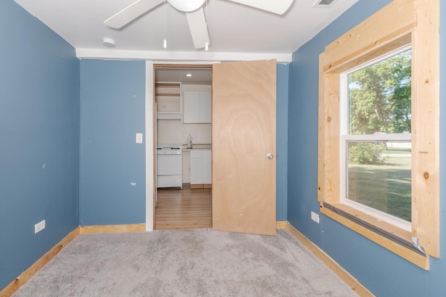 411 E Mazon St, Gardner, IL 60424 - unfurnished bedroom featuring baseboards and ceiling fan