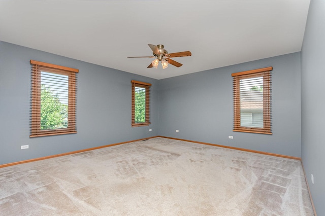 641 Downing St, New Lenox, IL 60451 - carpeted spare room featuring a ceiling fan and baseboards