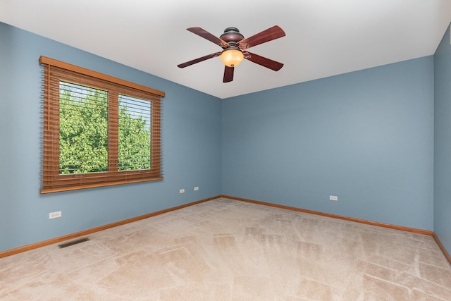 641 Downing St, New Lenox, IL 60451 - carpeted empty room featuring baseboards and ceiling fan
