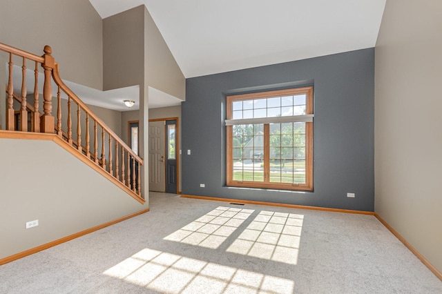 641 Downing St, New Lenox, IL 60451 - entryway featuring stairs, carpet, and vaulted ceiling