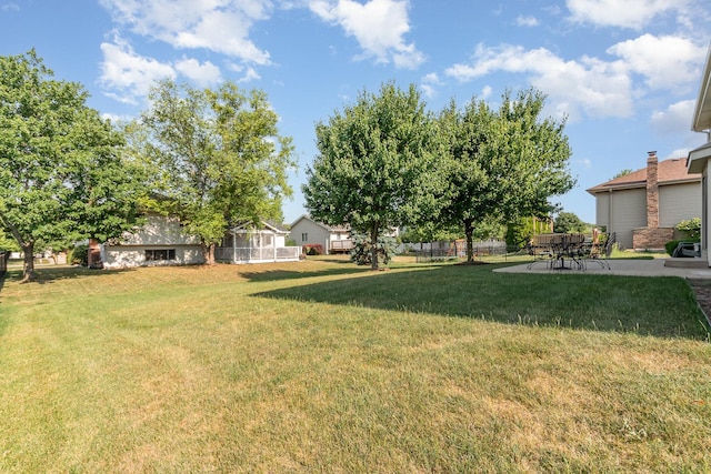 641 Downing St, New Lenox, IL 60451 - view of yard featuring a patio area