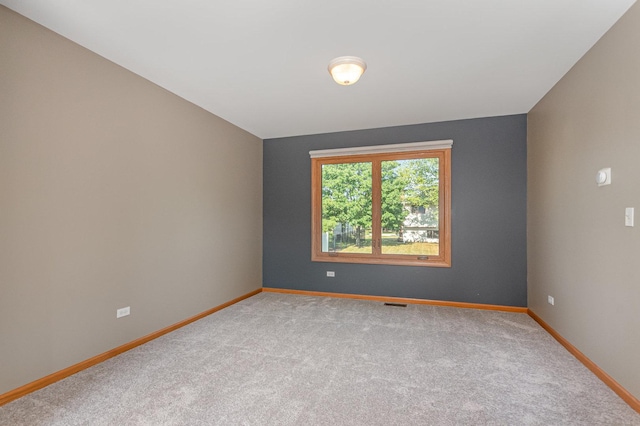 641 Downing St, New Lenox, IL 60451 - empty room with carpet and baseboards