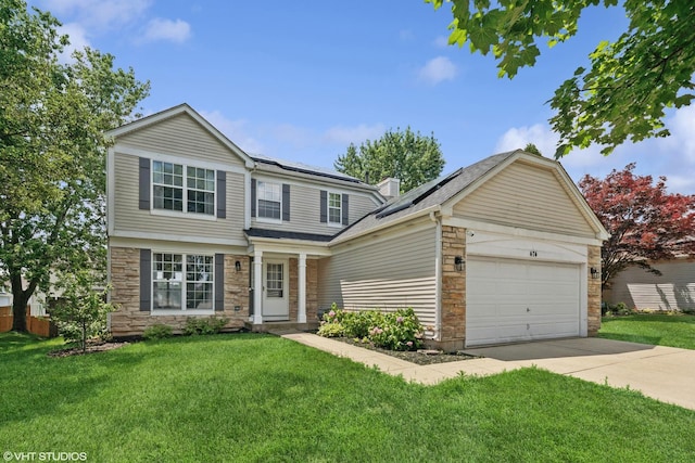 474 Wildflower Way, Bolingbrook, IL 60440 - view of front of house with stone siding, driveway, a garage, and a front lawn