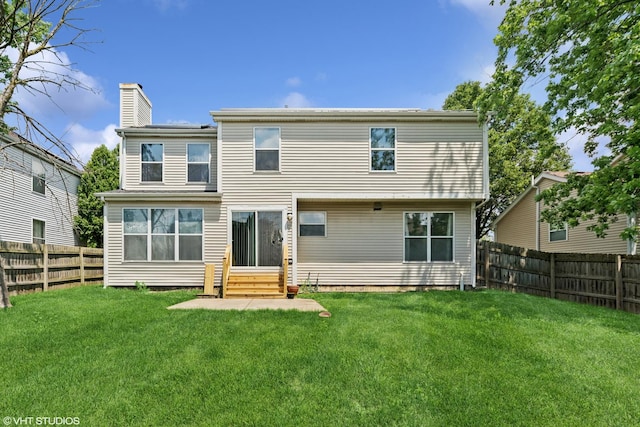 474 Wildflower Way, Bolingbrook, IL 60440 - rear view of property with a chimney, entry steps, and a fenced backyard