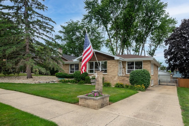 874 Hillandale Dr, Antioch, IL 60002 - view of front of home with brick siding, a gate, and a detached garage
