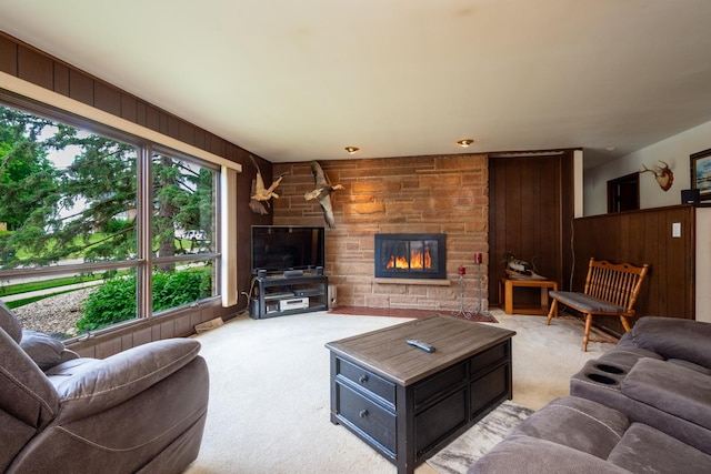 874 Hillandale Dr, Antioch, IL 60002 - living room with carpet flooring, wood walls, and a fireplace