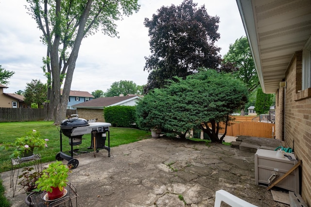 874 Hillandale Dr, Antioch, IL 60002 - fenced backyard with a patio area