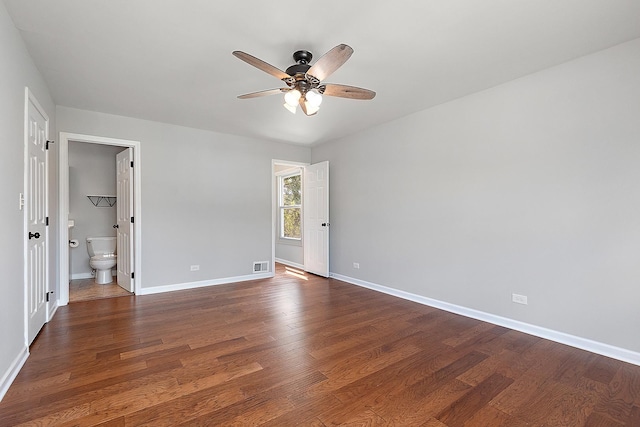 2725 Weeping Willow Dr Unit D, Lisle, IL 60532 - unfurnished bedroom featuring dark wood finished floors, connected bathroom, and a ceiling fan