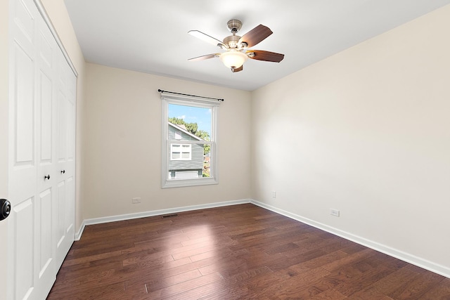 2725 Weeping Willow Dr Unit D, Lisle, IL 60532 - unfurnished bedroom with a closet, dark wood-type flooring, and ceiling fan