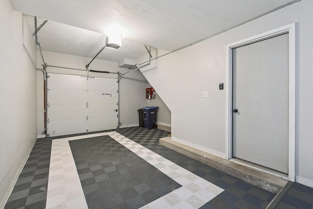 2725 Weeping Willow Dr Unit D, Lisle, IL 60532 - garage with a garage door opener and baseboards