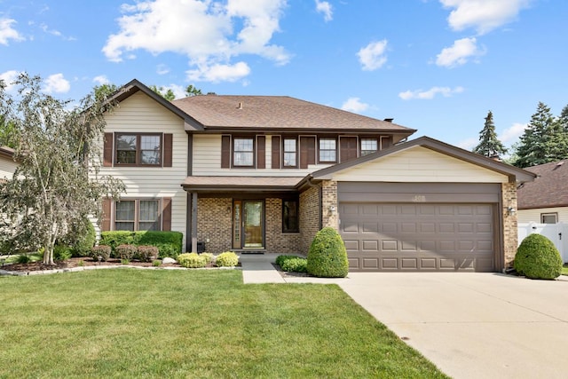 588 Montego Dr, Elk Grove Village, IL 60007 - view of front of house with driveway, brick siding, a garage, and a front yard