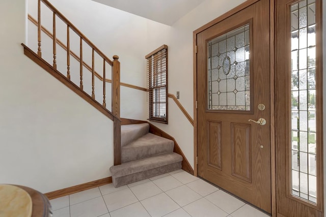 588 Montego Dr, Elk Grove Village, IL 60007 - entrance foyer featuring stairs and light tile patterned floors