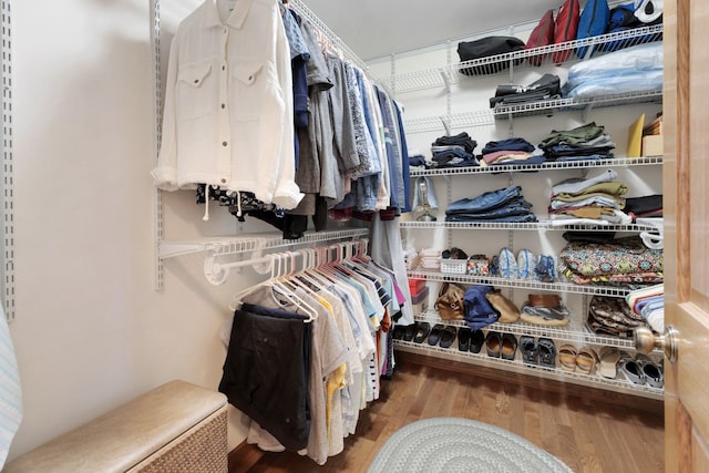 588 Montego Dr, Elk Grove Village, IL 60007 - walk in closet featuring wood finished floors