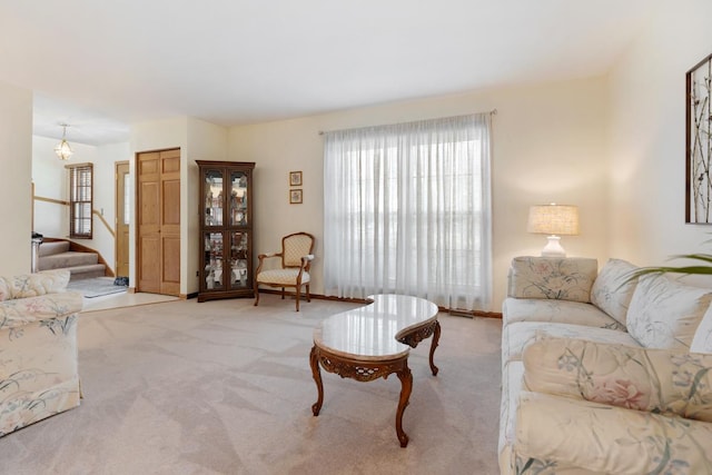 588 Montego Dr, Elk Grove Village, IL 60007 - carpeted living area featuring stairs