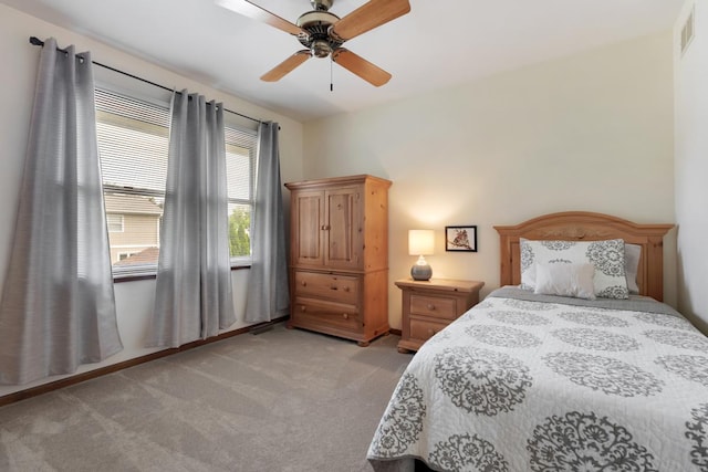 588 Montego Dr, Elk Grove Village, IL 60007 - bedroom with light carpet and ceiling fan