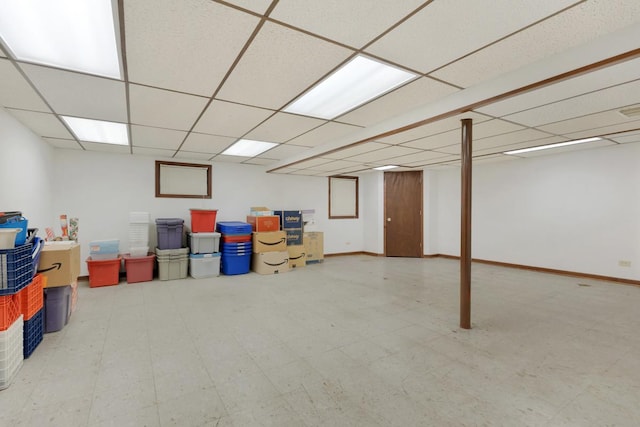 588 Montego Dr, Elk Grove Village, IL 60007 - finished basement featuring tile patterned floors and a paneled ceiling