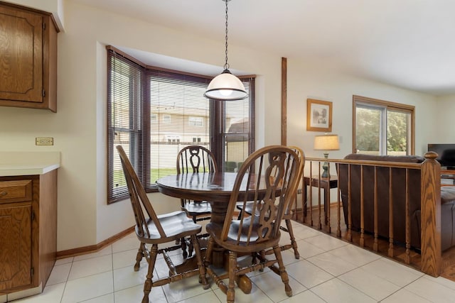 588 Montego Dr, Elk Grove Village, IL 60007 - dining room with baseboards and light tile patterned floors