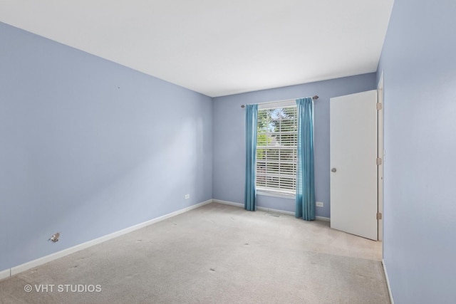 3087 Clifton Ct, Aurora, IL 60504 - carpeted empty room with baseboards