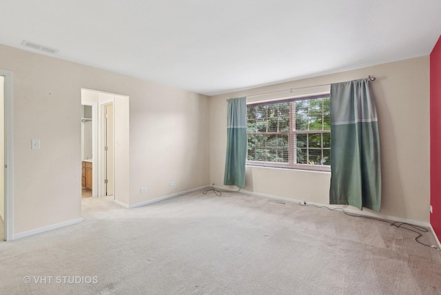 3087 Clifton Ct, Aurora, IL 60504 - carpeted spare room featuring baseboards