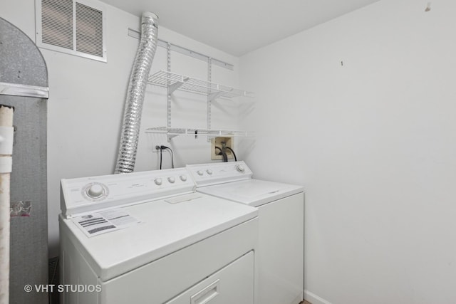 3087 Clifton Ct, Aurora, IL 60504 - laundry room with washer and dryer