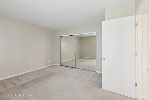 3087 Clifton Ct, Aurora, IL 60504 - unfurnished bedroom with carpet floors and a closet