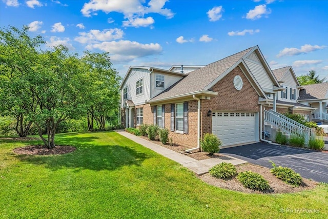 16 Christie Ct Unit 16, Algonquin, IL 60102 - view of front of property with brick siding, driveway, a shingled roof, and a front yard