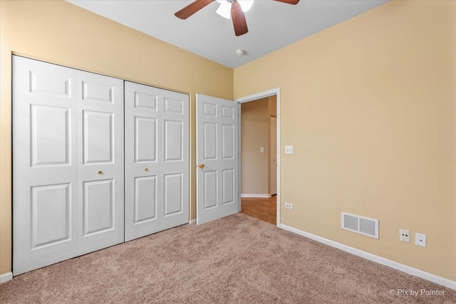 16 Christie Ct Unit 16, Algonquin, IL 60102 - unfurnished bedroom featuring carpet, a closet, and a ceiling fan