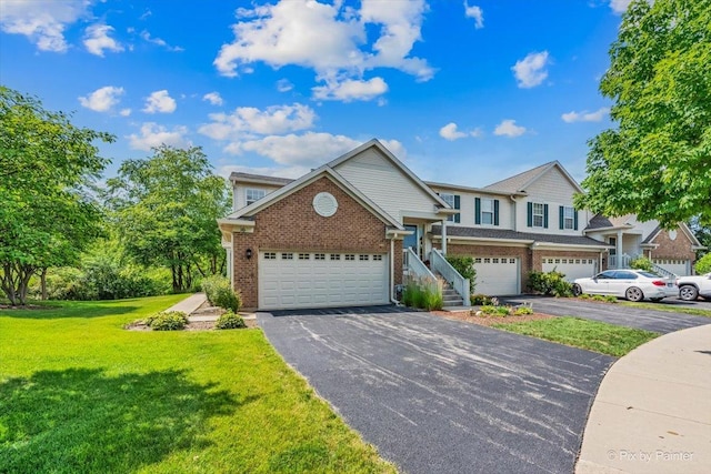 16 Christie Ct Unit 16, Algonquin, IL 60102 - traditional-style house with driveway, brick siding, and a front yard