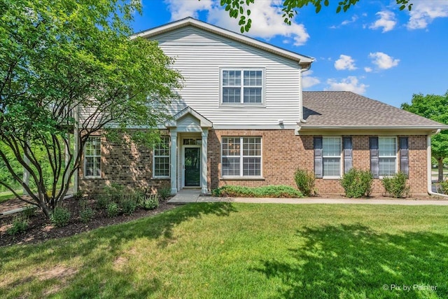 16 Christie Ct Unit 16, Algonquin, IL 60102 - view of front of property featuring a front yard, brick siding, and a shingled roof