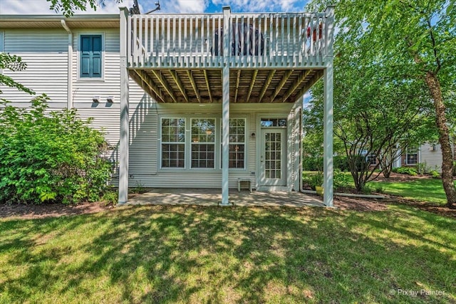 16 Christie Ct Unit 16, Algonquin, IL 60102 - back of property featuring a lawn, a patio, and a wooden deck