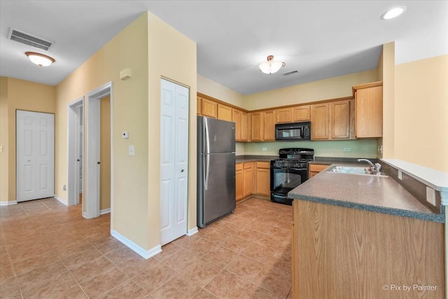 16 Christie Ct Unit 16, Algonquin, IL 60102 - kitchen with black appliances, dark countertops, and light tile patterned floors