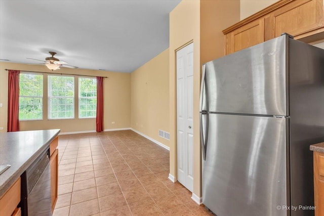 16 Christie Ct Unit 16, Algonquin, IL 60102 - kitchen featuring appliances with stainless steel finishes, a ceiling fan, and light tile patterned floors