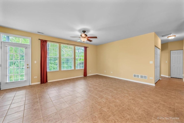 16 Christie Ct Unit 16, Algonquin, IL 60102 - unfurnished room featuring a ceiling fan, healthy amount of natural light, and light tile patterned floors