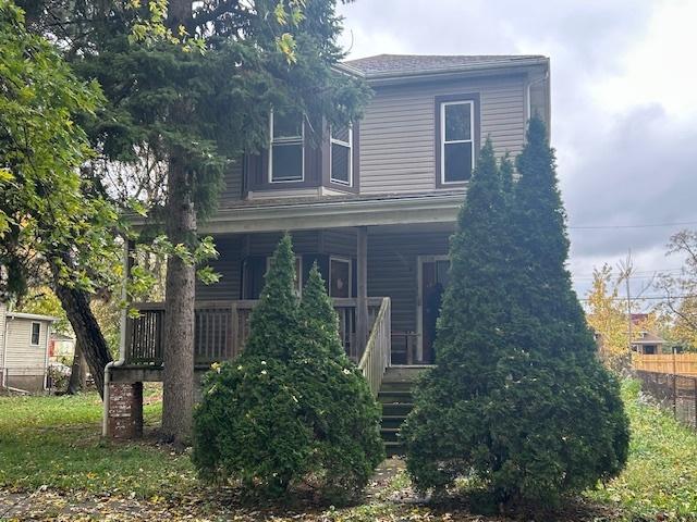 10230 S Union Ave, Chicago, IL 60628 - view of front of property featuring covered porch and stairs
